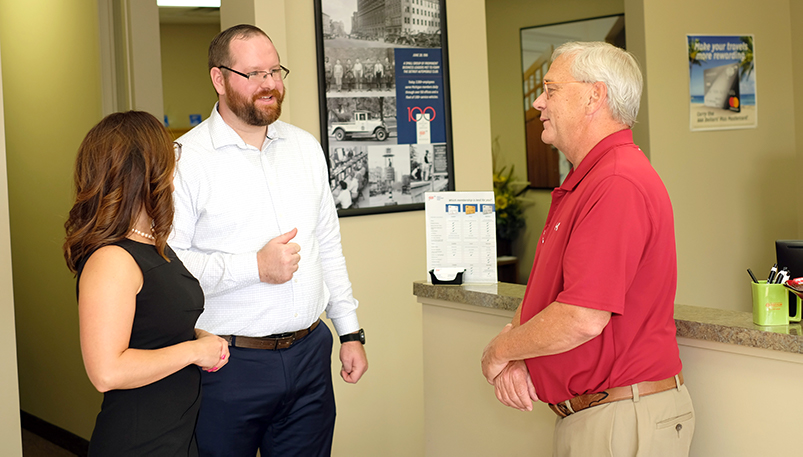 Eric & Chilah consulting with a client